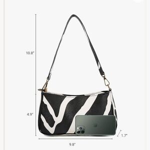 Zebra print leather handbag